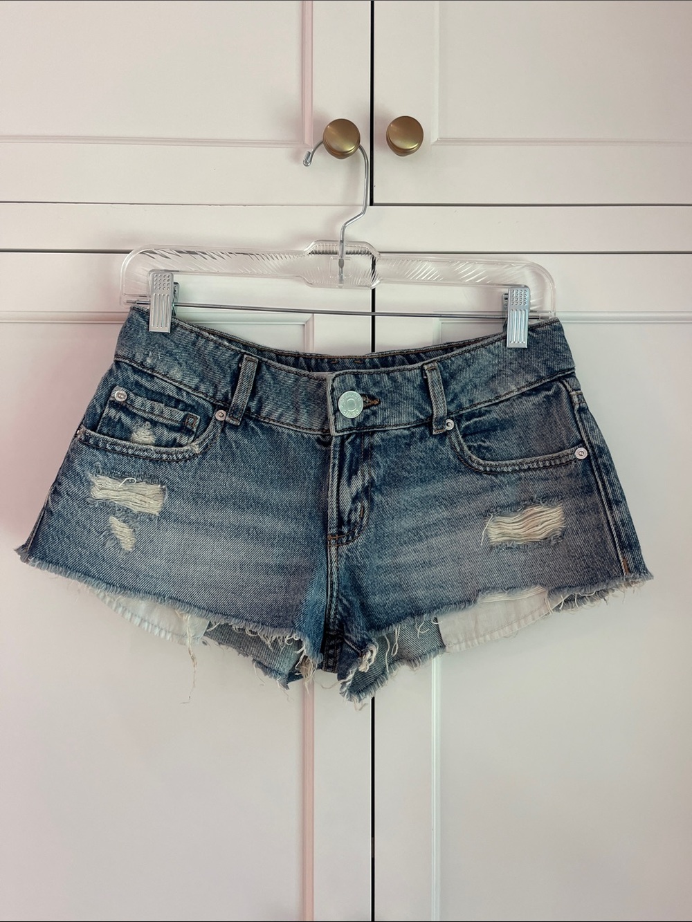 Garage Women's Distressed Denim Shorts in Faded Blue